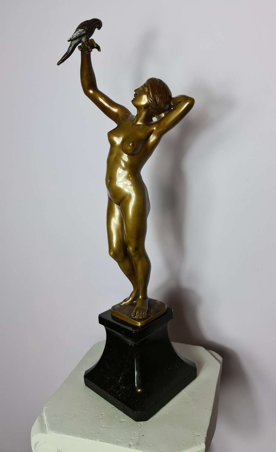 Art Deco Bronze of a Nude holding a Parakeet by Gotthilf Jaeger c1920