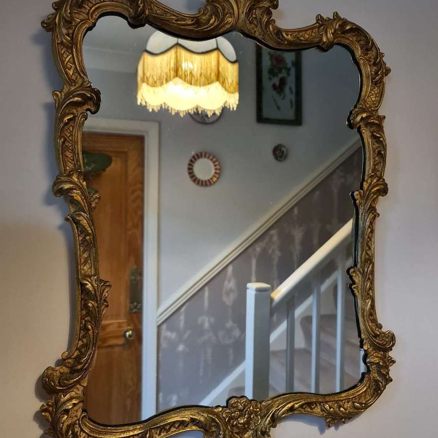 Good Wall Mirror with gilt metal frame in Rococo style