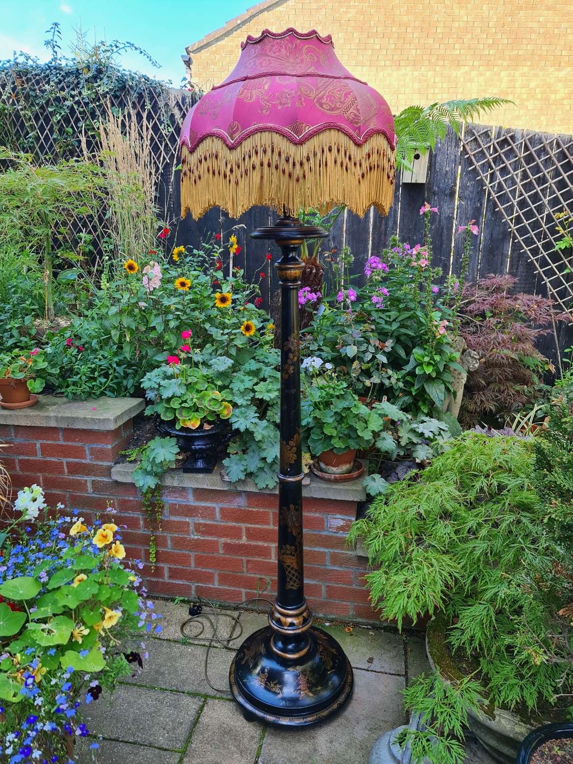 A large Black Lacquered Standard Lamp with Chinoiserie Design