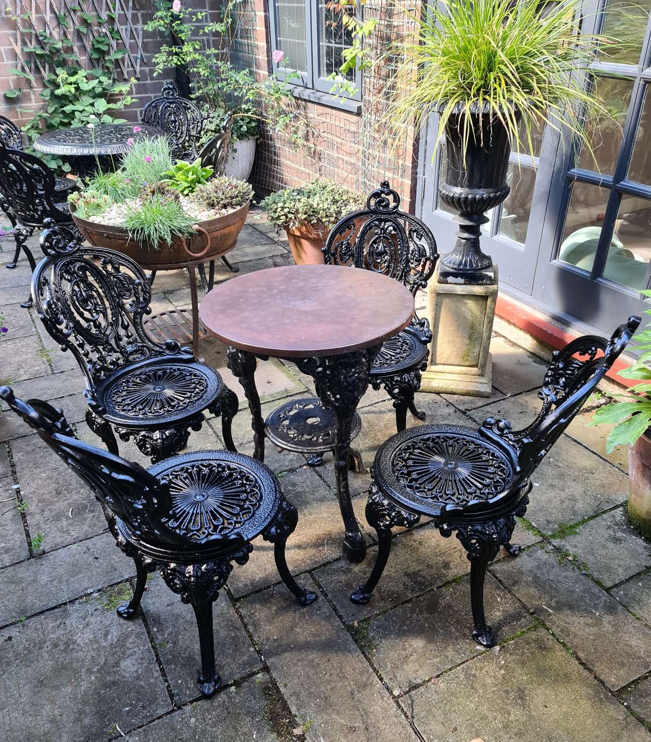 Wonderful heavy Cast-iron Garden Set of Table and Four Chairs