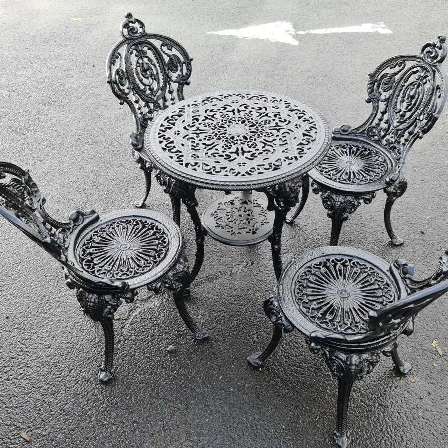 Wonderful Cast-iron Garden Set inc. Four chairs and One Table