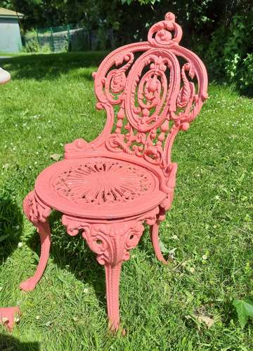 Set of Four Cast-iron Garden Chairs together with a cast-iron Table