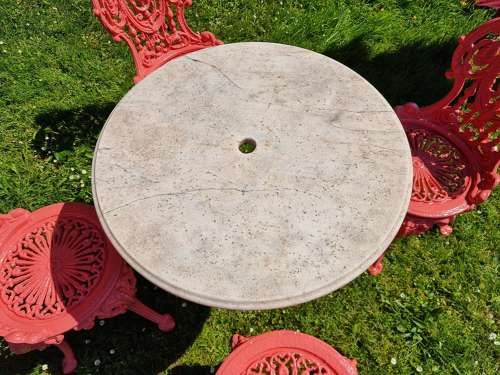 Set of Four Cast-iron Garden Chairs together with a cast-iron Table