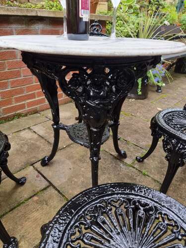 Heavy Cast-iron Set of Garden Table and Four Chairs